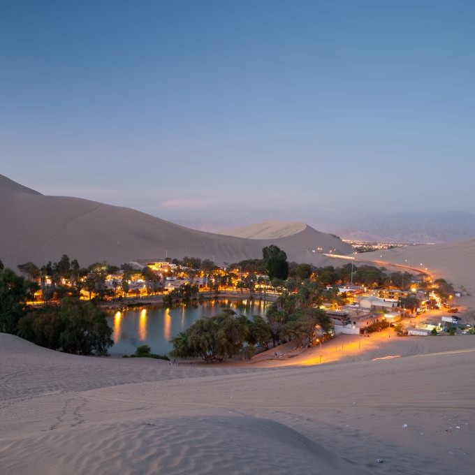 Sandboard Down Desert Dunes in Huacachina - Trazee Travel